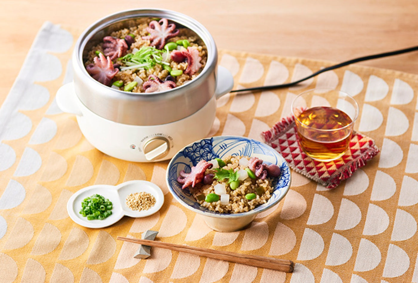 Brown rice cooked with baby octopus and edamame in the BRUNO Compact Multi Grill Pot